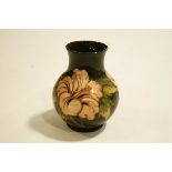 A Moorcroft Hibiscus pattern Vase of bulbous form, Impressed Moorcroft mark to base,