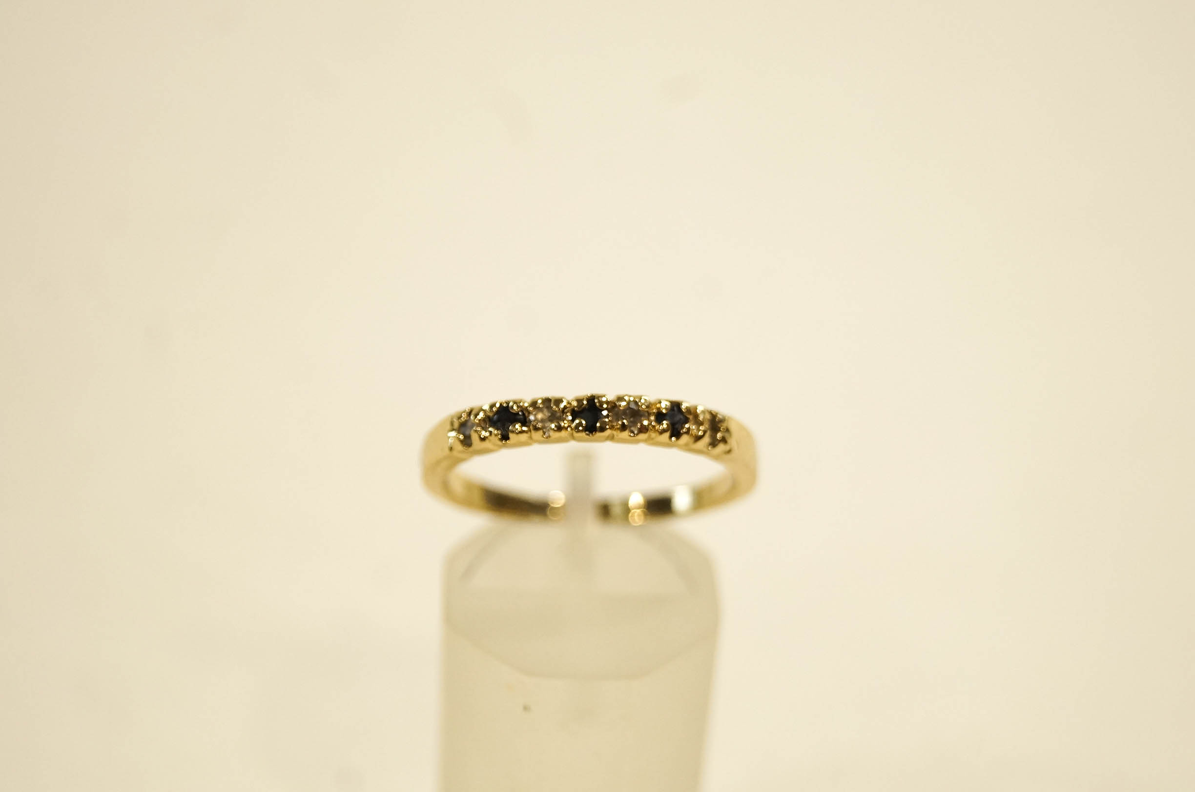 A gold plated stone set half hoop ring, - Image 2 of 2