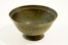 A Chinese brass bowl on a footed base, engraved dragons with decorative borders and panels,