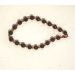 A cherry amber and amber necklace,