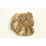 A polished ammonite, 28 cm diameter x 29cm high.