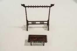 A Chinese hardwood jewellery/implement stand, carved with dragons,