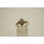 A 9 carat gold thirty one stone diamond cluster ring, finger size P, 2.