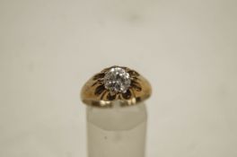 A gentleman's single stone 9 carat gold ring, finger size R1/2, 3.