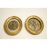 A pair of 19th Century silk embroideries, each in oval gilt frames, 10.