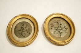 A pair of 19th Century silk embroideries, each in oval gilt frames, 10.