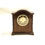 A 20th Century mahogany cased mantel clock with a French eight day movement,