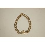 A 9 carat gold bracelet, of hexagonal outline links, 22 cm long, 17.