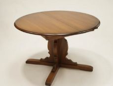 A 1960s rosewood extending dining table with two additional leaves, by H Sigh & Sons, Denmark,