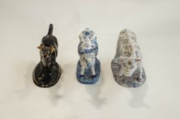 Three ceramic models of dairy cows as creamers, one with Delft style glaze decor,