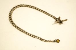 A silver watch chain, of graduated solid curb links, with a T bar, 37 cm long,