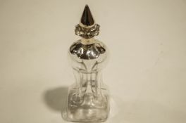 A silver mounted glass glug glug decanter, by Martin Hall & Co, London 1902,