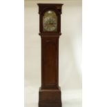 An oak longcase clock with eight day movement and silvered dial and Roman numerals, Anthony Marsh,