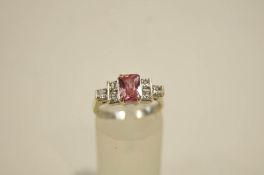 A 9 carat white gold ring, set with pink and colourless stones, finger size L, 3.