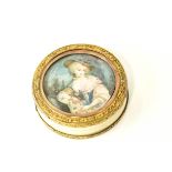 A circular ivory French box, circa 1900, set with a miniature of a young lady to the pull off cover,
