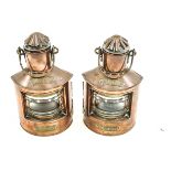 A pair of Dutch copper and brass band ships lamps, bearing 'Port' and ''Starboard' plaques.