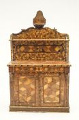 An unusual Victorian parquetry dresser, with all over specimen wood inlah,