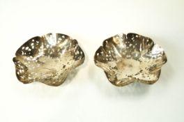 A pair of silver bon bon dishes, Birmingham 1953, of round crimped and pierced form,