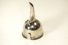A Georgian Silver wine funnel, makers mark worn, London 1806, of plain form, 12.5 cm long, 106 g (3.