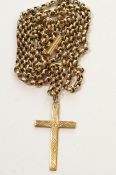 A cross pendant, stamped '9ct', on a chain tagged '9c', pendant 3.1 cm long, chain 51 cm long, 7.
