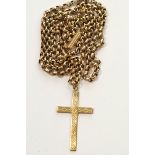 A cross pendant, stamped '9ct', on a chain tagged '9c', pendant 3.1 cm long, chain 51 cm long, 7.