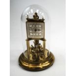 A German Violeta brass anniversary clock,