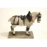 A Royal Copenhagen porcelain figure of a Shire Horse, printed factory marks, and signed C.J.