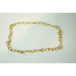 A 9 carat gold necklace, of hollow links, 60 cm long,