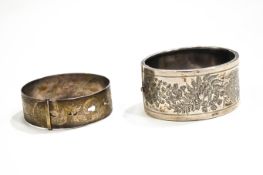 A silver bangle by Charles Horner,