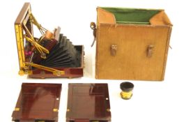 A late 19th/early 20th Century mahogany cased plate camera, with plaque 'The National Camera',