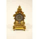A 19th Century French gilt metal mantel clock, in the Classical style,