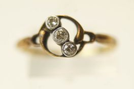 A three stone diamond ring, stamped '18ct',