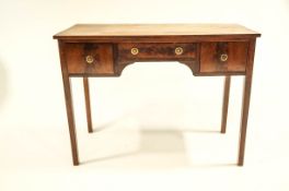 A small 19th Century mahogany sideboard, on square tapering legs,