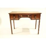 A small 19th Century mahogany sideboard, on square tapering legs,