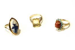A 9 carat gold citrine ring, 4 g gross; a Delft set ring, stamped '9ct',