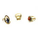 A 9 carat gold citrine ring, 4 g gross; a Delft set ring, stamped '9ct',