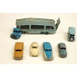 Six Dinky vehicles, including a car transporter,