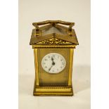 A French brass carriage clock, retailed by Sir John Bennett Ltd,