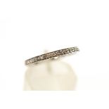 A 9 carat white gold and eighteen stone diamond half hoop ring,