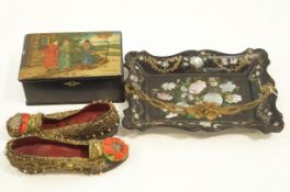 A pair of decorative 19th Century shoes, a Russian papier mache box,