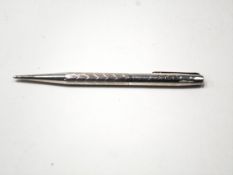 A Yard-o-Led silver engine turned propelling pencil engraved with initials "JPR",