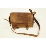 An old leather fishing tackle satchel