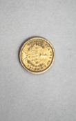 An 1849 one dollar gold coin