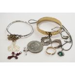 A small collection of costume jewellery, including a silver ring,