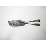 A George III silver fiddle pattern fish slice, with foliate pierced and engraved blade,