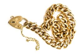 A bracelet, of hollow curb links to a padlock clasp stamped '9ct', 17.5 cm long, 9.