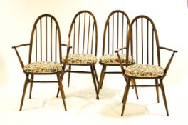 A set of eight Ercol Windsor stick back dining chairs
