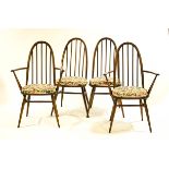 A set of eight Ercol Windsor stick back dining chairs