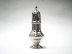 A silver pear-shaped sugar caster with a wrythen finial,