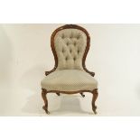 A Victorian spoon back nursing chair,